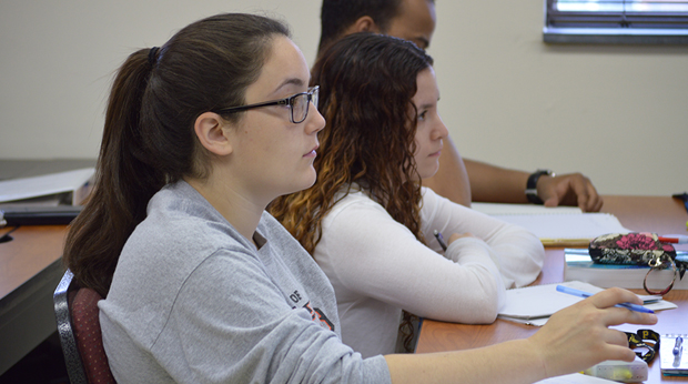 Three students in classroom